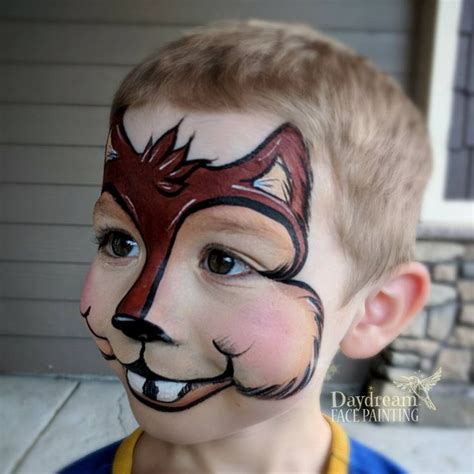 Tiger Halloween Face Paint. Tigers are fierce in the jungle, but majestic as a Halloween costume! Yes, wearing orange and black stripes is a must—but go the extra mile by painting your whole face orange and drawing on some black and white whiskers. The Merry Thought. 8.